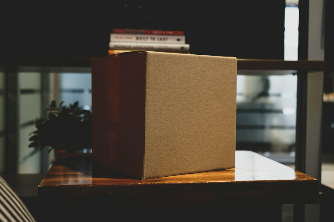 Stack of archival folders and documents on a table