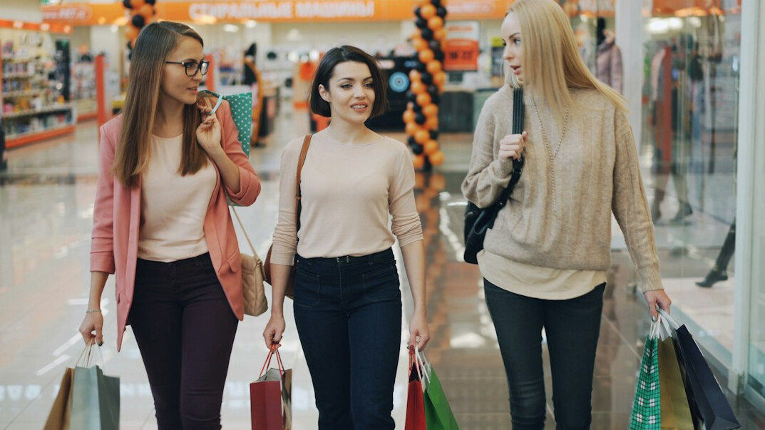 happy shoppers in mall