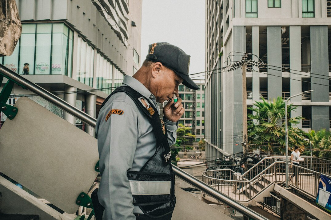store detective observing customers