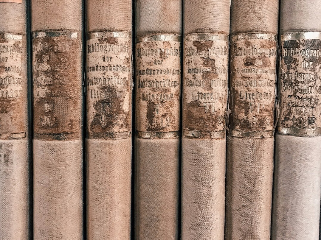 Stack of old newspapers on a wooden table