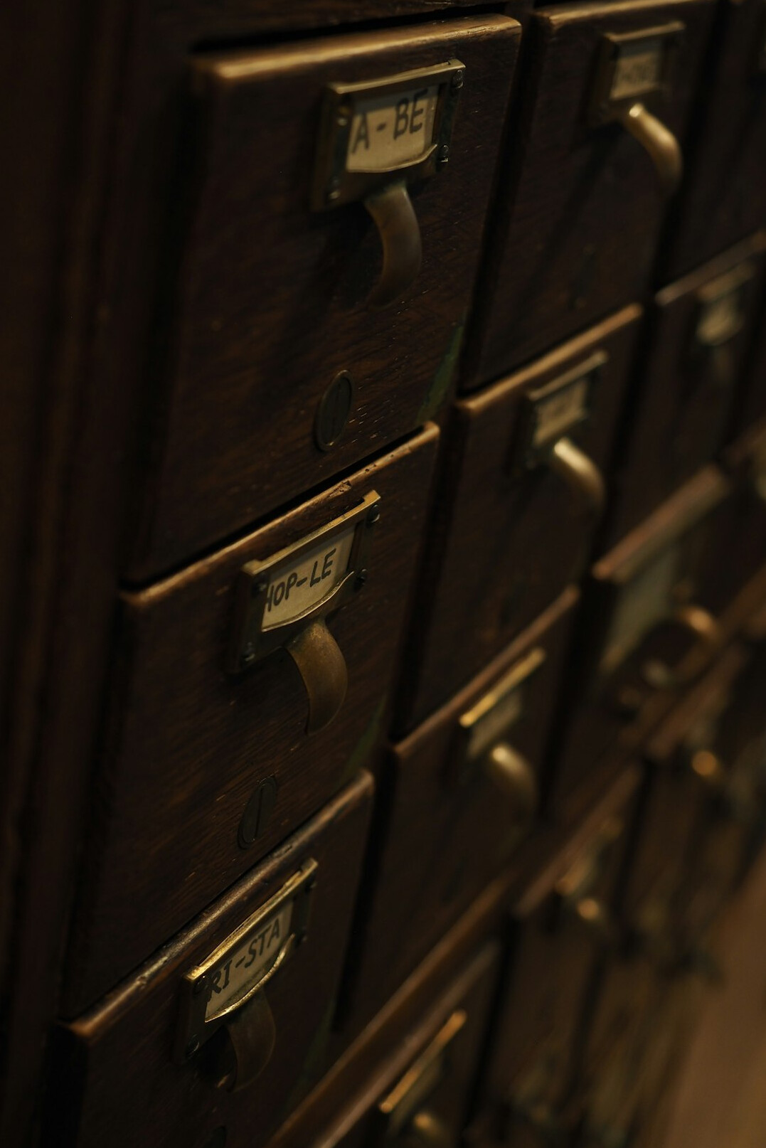 Rows of filing cabinets in a historical archive room