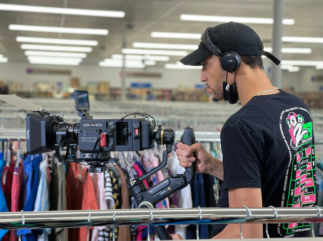 store manager reviewing cameras
